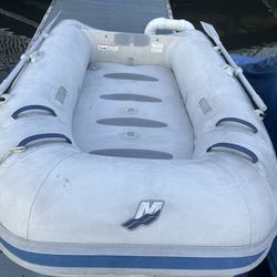 8 foot  Mercury Tender inflatable raft hard bottom  great for going to shore  from boat Goes soft on one side over a week.   *Slow leak *   Still plen