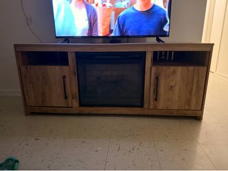 Ashley’s furniture tv stand with electric fireplace