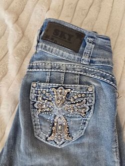 Flare jeans with gems on back size 1/2