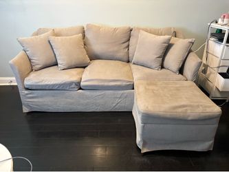 Gray three seat couch with storage ottoman (Bob’s discount furniture)