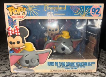 Dumbo the Flying Elephant Attraction and Minnie Mouse Funko #92 from the Disneyland 65th Anniversary collection