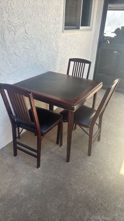 Card table and three chairs