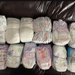 New Diapers And Training Pants, Size 5-6, around 70-80 total $25 for all