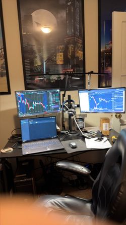 Two monitors with stand