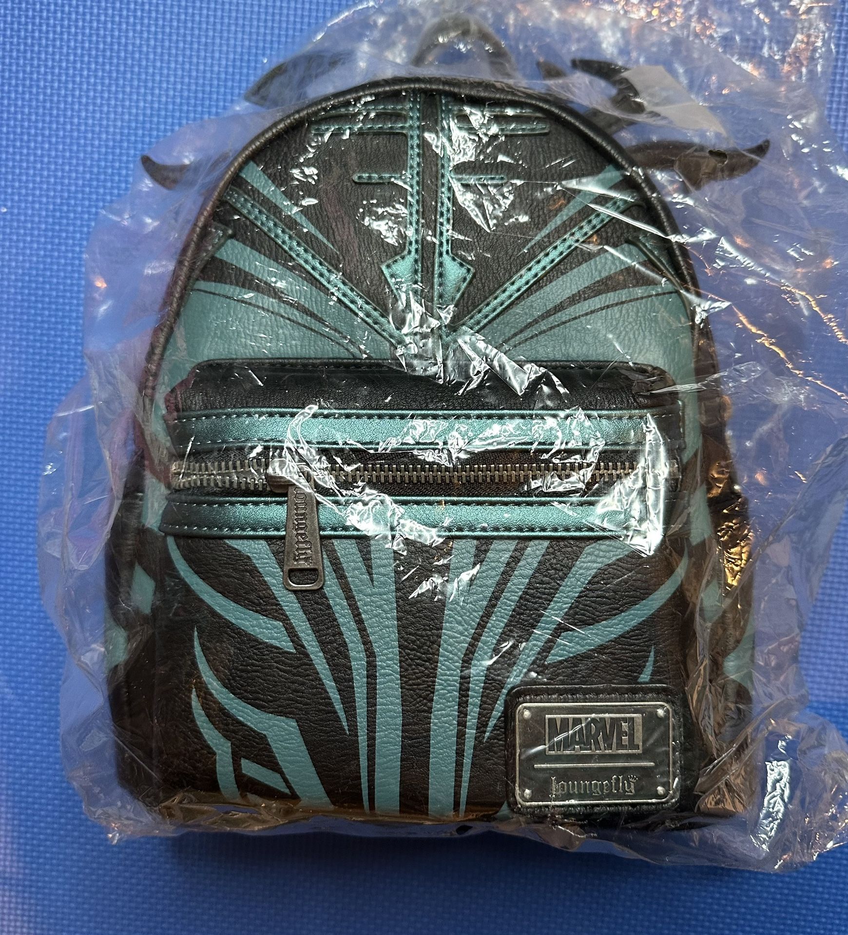 LOUNGEFLY EXCLUSIVE MARVEL THOR RAGNAROK HELA COSPLAY MINI BACKPACK - NWTs Size: W: 9" X H: 10.5" X D: 4.5" Faux Leather, applique, metallic, and pri