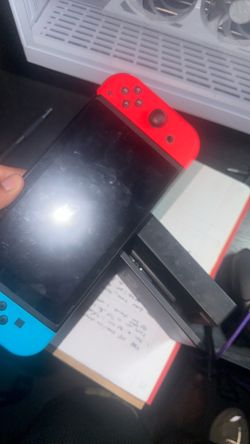 Nintendo switch Console, Dock, and 2 GameCube controllers and Super Smash Bros Ultimate