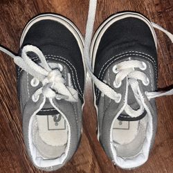 black and gray infant vans 