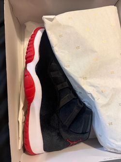 Air Jordan 11 Retro Bred Sneakers