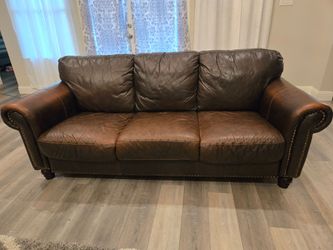 Leather couch and XL rug