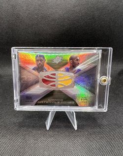 LeBron James and Kobe Bryant game used jersey card LeBron James and Kobe Bryant game used jersey card