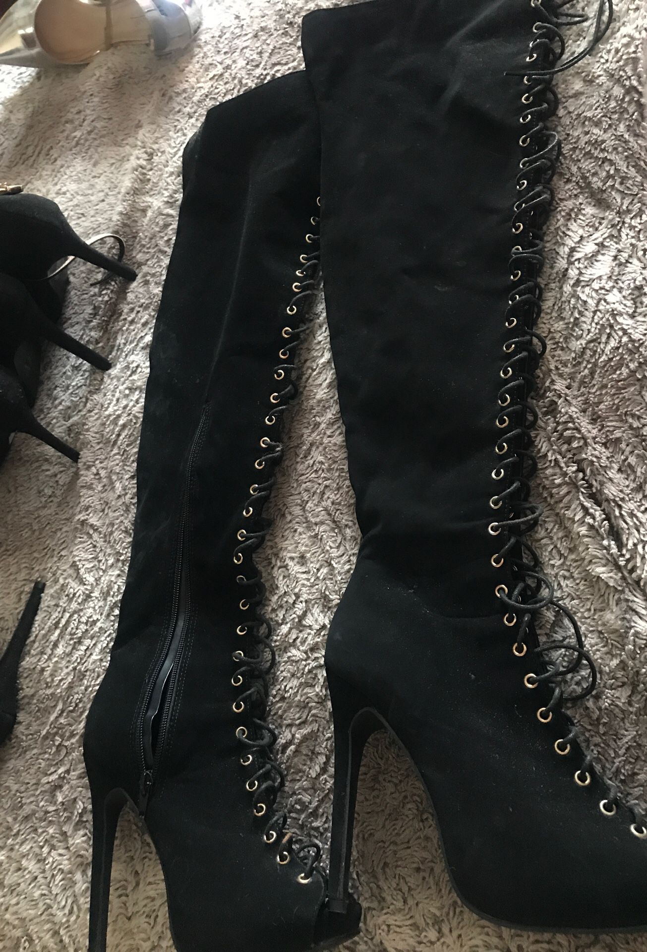 Thigh high black suede boots Super Bowl it’s laced up size a brand new open box never worn
