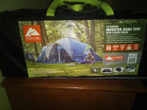 Photo Brand new campers in modified dome tent with screen porch