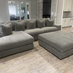 New Gray Sectional Group with Chaise and Large Ottoman, extra pillows and 3 gray barstools