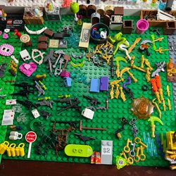 $2 each Lego parts accessories tools weapons swords etc.