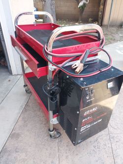 SEARS  AR BATTERY CHARGER ATTACHED TO A UTILITY GOOD QUALITY CART EXCELLENT CONDITION