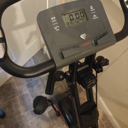 Adverno Magnetic Exercise/Fitness Folding Stationary Bike With Arm Resistance Band For Simultaneous Arm Workout 