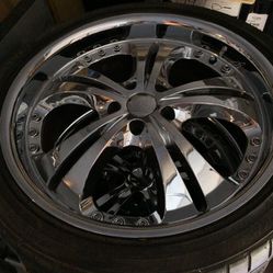 20" chrome rims w/ low pro tires