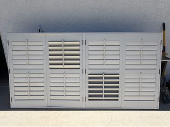 White plantation window  and sliding doors shutters