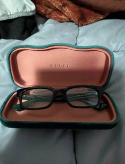 Gucci unisex glasses/Frames