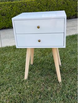 Small white nightstand with two drawers Small white retro nightstand with two drawers