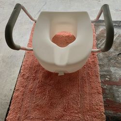 RAISED TOILET SEAT