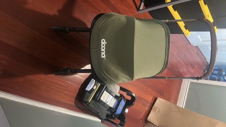 Doona olive green canopy with brown leather strap