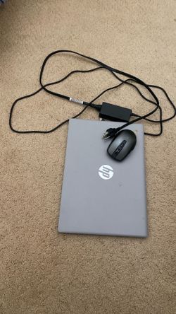 HP Chromebook with wireless mouse and charger
