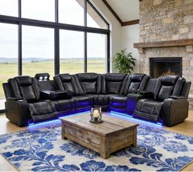Power electric black leather fully reclining wrap around sectional couch