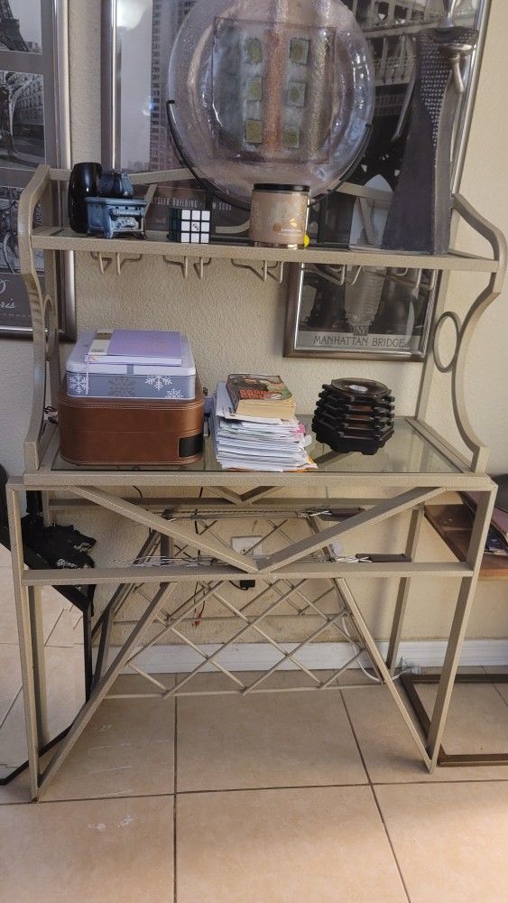 Cute little entry table, coffee bar, or wine bottle holder.