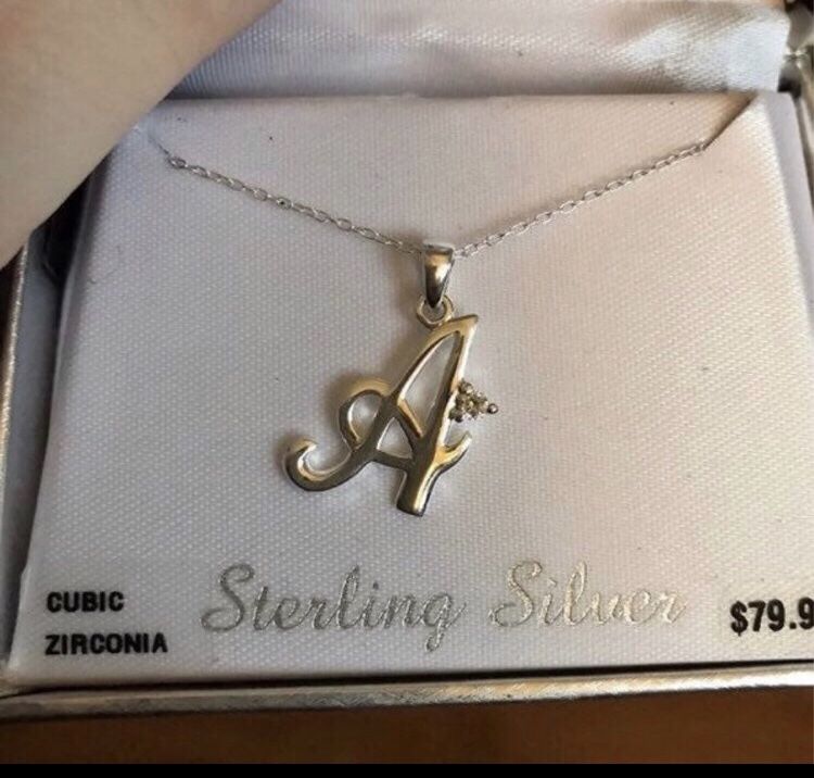 Sterling silver necklace with diamond A pendant.