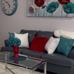 three-Piece Living Room Set faux leather By Signature Ashley