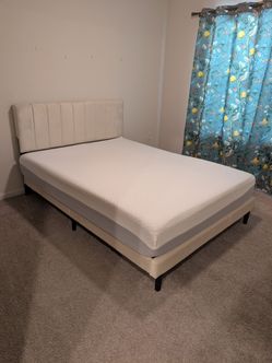 Queen sized mattress & frame