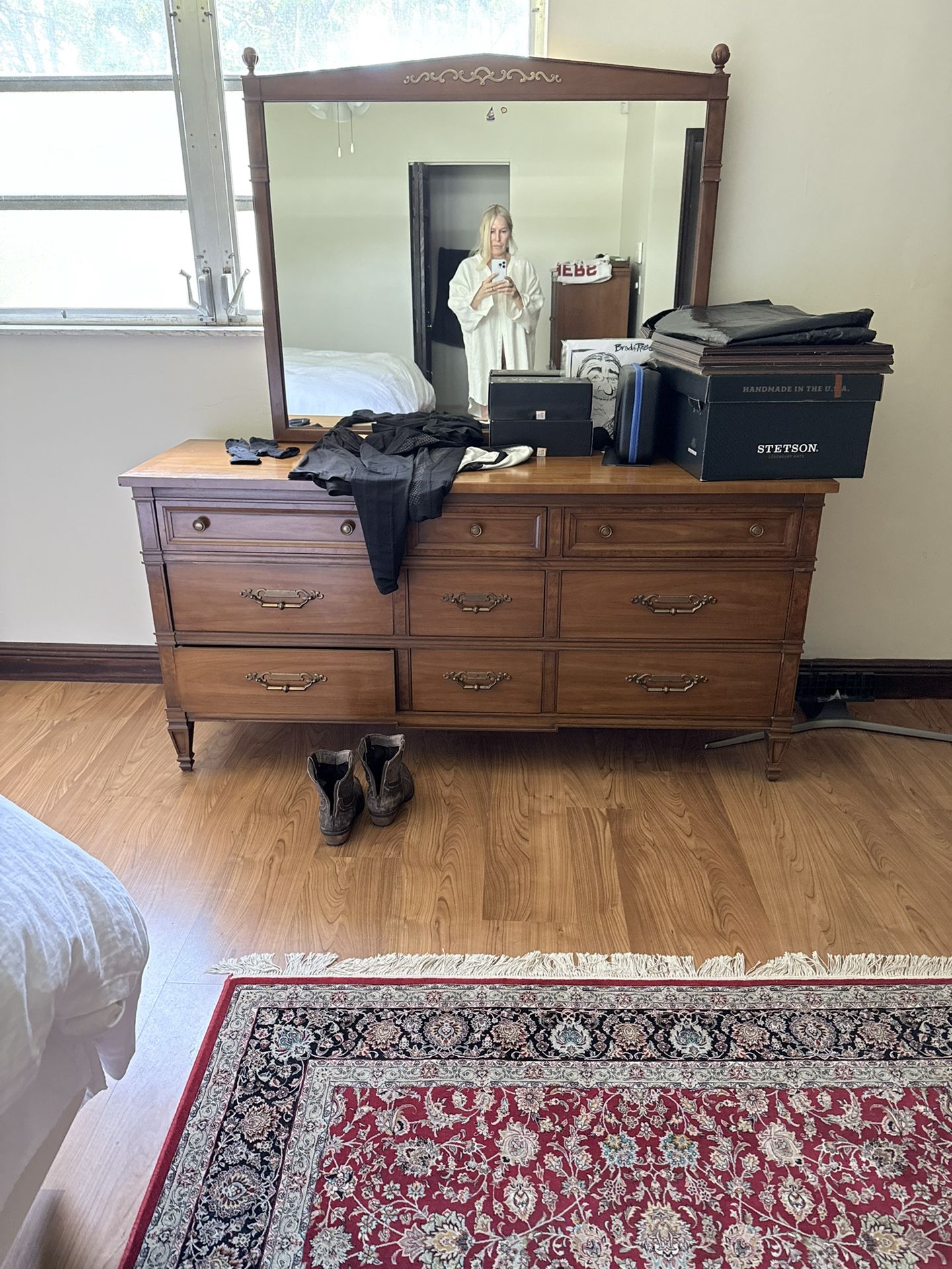 Antique bed, two nightstands, dresser with mirror