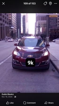 Maroon Chevy Traverse LT