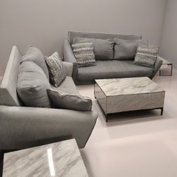 Living Room Set...Tilted couch and love seat
Free delivery 
No deposit necessary 
Cash on delivery