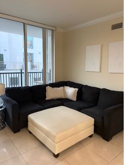 Black L shaped couch