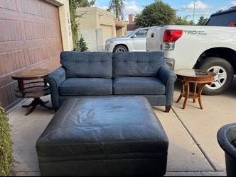 Family room furniture, 2 Lazyboy sofas,leather top end table.