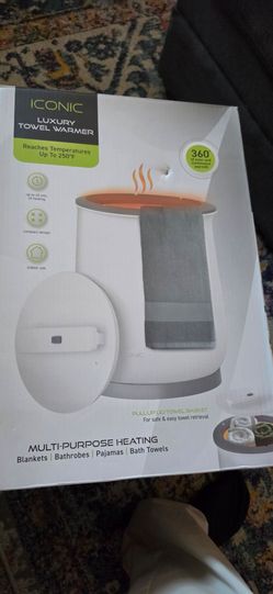 Iconic luxury towel warmer