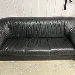 Black leather couch. 