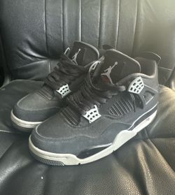 Jordan 4 “black canvas”