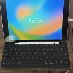 iPad with Apple keyboard and Apple Pencil