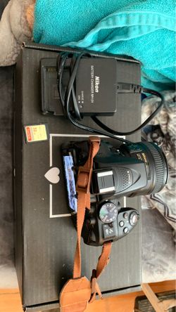 NIKON D5300 DSLR / 18-50mm lens / battery and charger / neck strap
