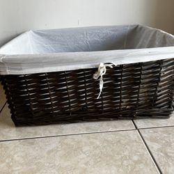 Wicker Basket With Liner… 9.5” H By 21” W By 18” D…SEE ALL PICTURES…$10