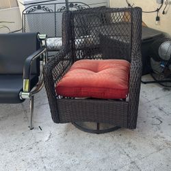Dark Brown Wicker Rocking/swivel Huge Chair With Orange Cushion