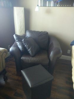 Chair and ottoman and pillows