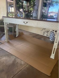 Free desk 56 1/2” wide,  22 1/2” deep, 29 1/4” tall.