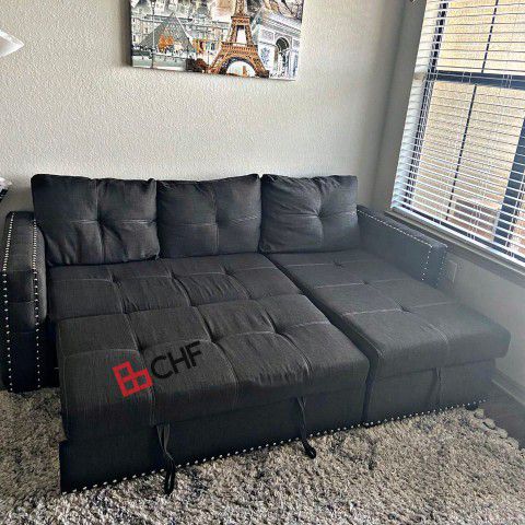 Living room sectional sofa with storage chaise and pull out sofa bed