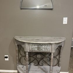 Antique wood half moon console table with drawer and shelf in excellent condition .  The measurements are 39”Lx16” Wx33” H Gray color with metal back 