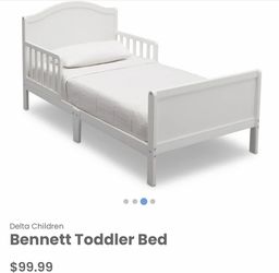 New Bennett white wood toddler bed frame (mattress sold separately)