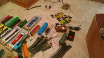 Several trains for train set also the railing & power supplys